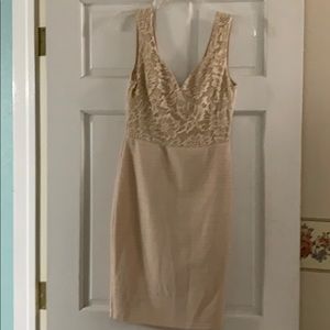 Cream colored dress. Wore one time for a wedding.